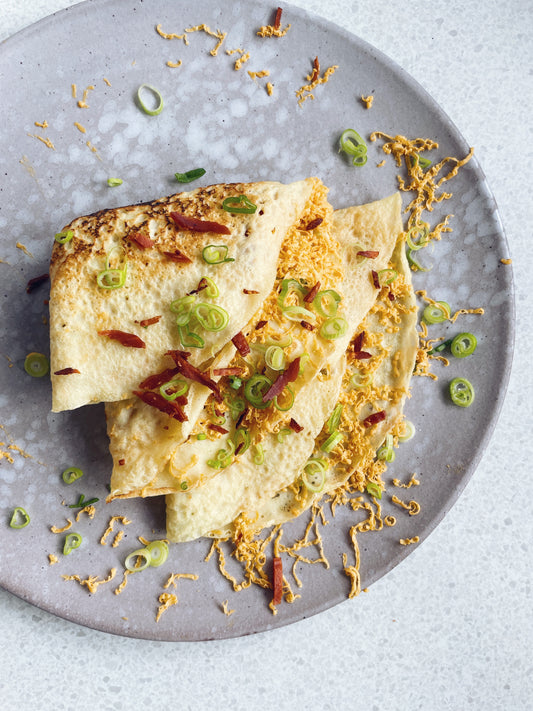 cheese pancakes with bacon and spring onions